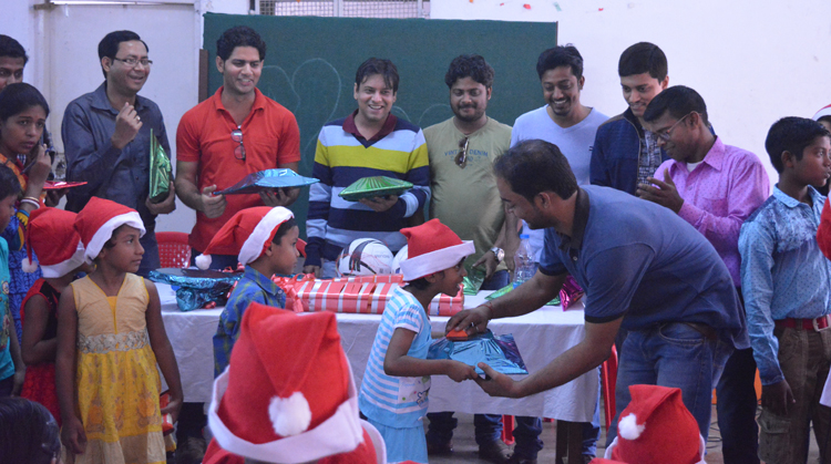 Our team members handing over gift