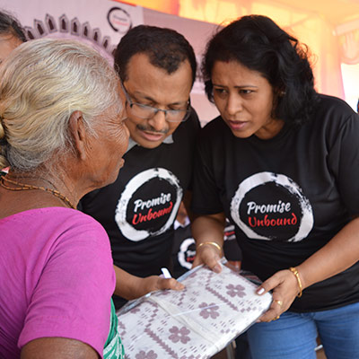 Gifting saree to an old lady